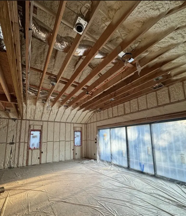 Interior walls and ceiling insulated with spray foam during new construction in Ashtabula